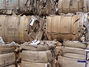 Compressed cardboard bales ready for recycling