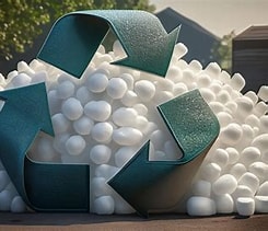 Recycling symbol on a pile of white styrofoam pellets